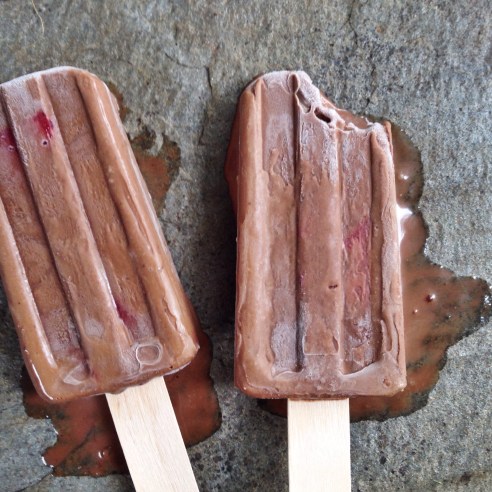 strawberry covered chocolate popsicle